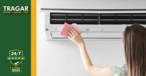 Woman cleaning ac and filters